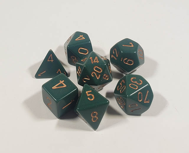 A close up of the Chessex Opaque Dusty Green with copper polyhedral dice set.