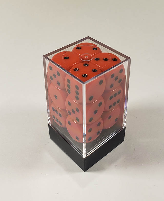 A close up of the Chessex Opaque Orange with Black 16mm d6 dice set in its package.