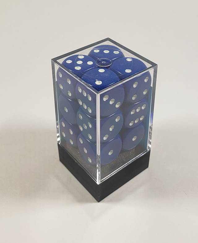 A close up of the Chessex Opaque Blue with White 16mm d6 dice set in its package.