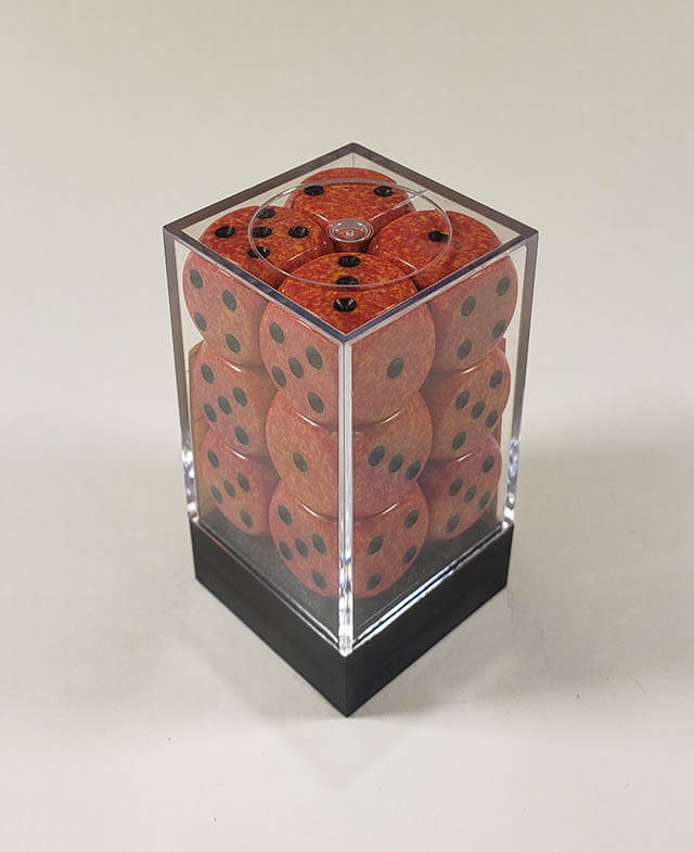 A close up of the Chessex specked fire 16mm d6 dice set in its package.