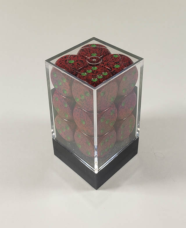 A close up of the Chessex specked Strawberry 16mm d6 dice set in its package.