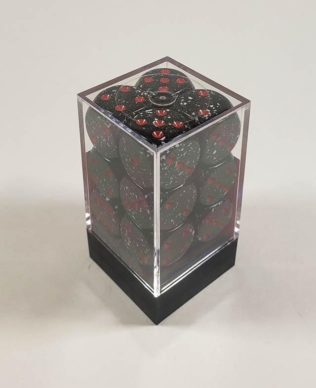 A close up of the Chessex specked space 16mm d6 dice set in its package.