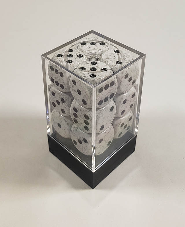 A close up of the Chessex specked arctic camo 16mm d6 dice set in its package.