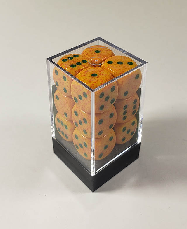 A close up of the Chessex specked lotus 16mm d6 dice set in its package.