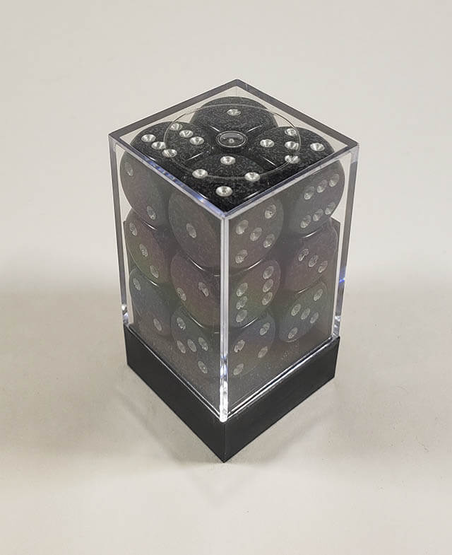 A close up of the Chessex specked ninja 16mm d6 dice set in its package.