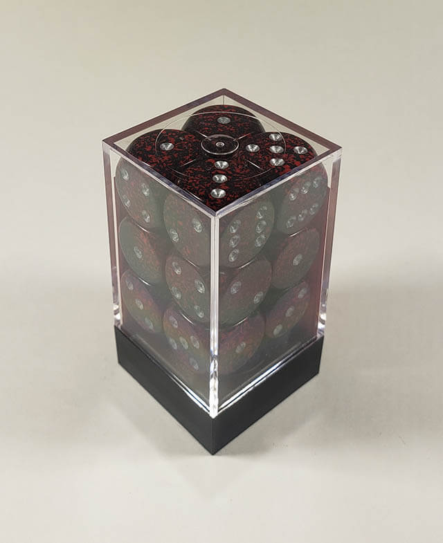 A close up of the Chessex specked silver volcano 16mm d6 dice set in its package.