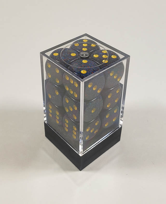 A close up of the Chessex specked twilight 16mm d6 dice set in its package.