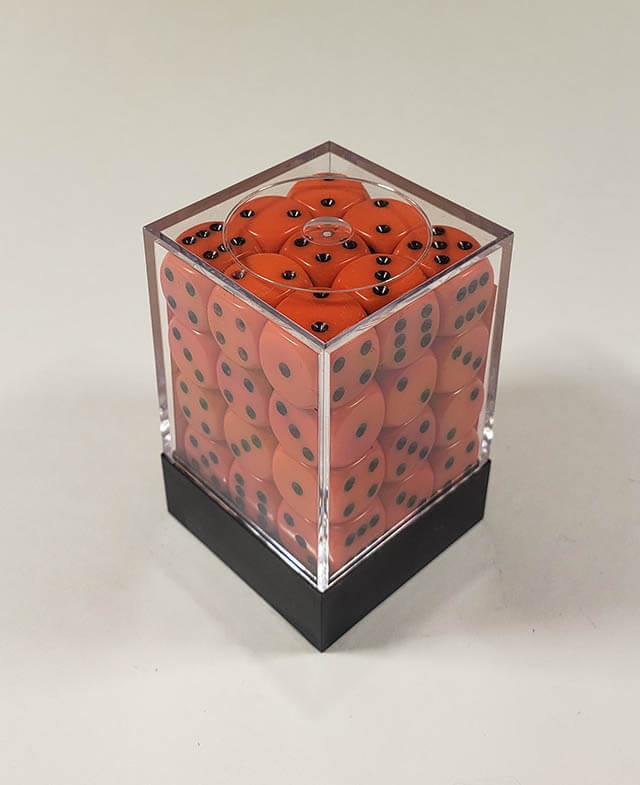 A close up of the Chessex Opaque Orange with Black 12mm d6 dice set in its package.