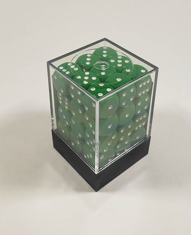 A close up of the Chessex Opaque Green with White 12mm d6 dice set in its package.