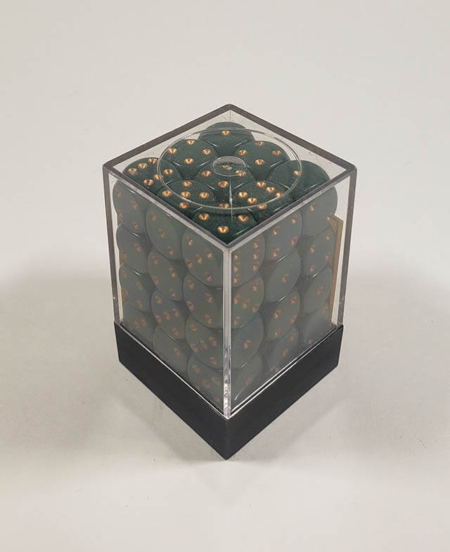 A close up of the Chessex Opaque Dusty Green with Gold 12mm d6 dice set in its package.