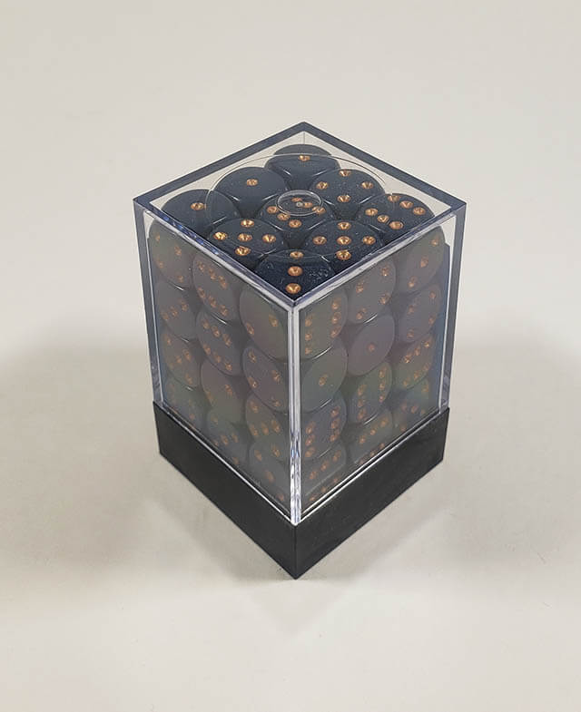 A close up of the Chessex Opaque Dusty Blue with Copper 12mm d6 dice set in its package.