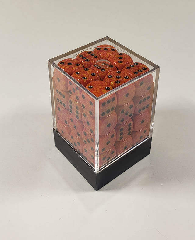 A close up of the Chessex specked fire 12mm d6 dice set in its package.