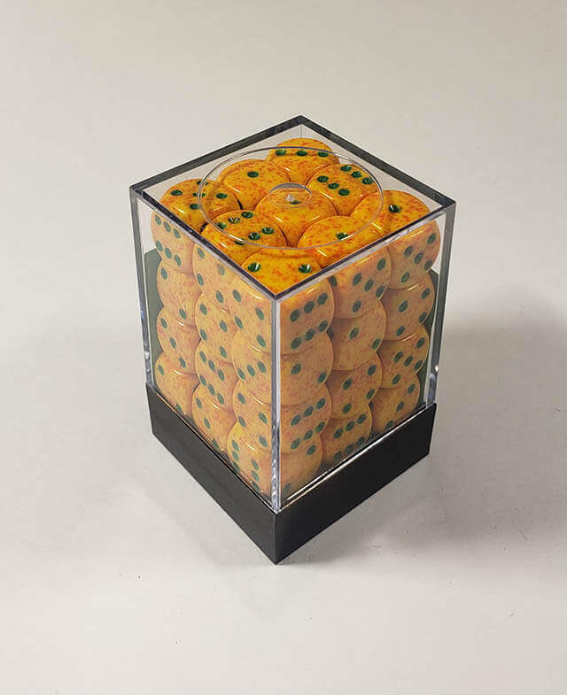 A close up of the Chessex specked lotus 12mm d6 dice set in its package.