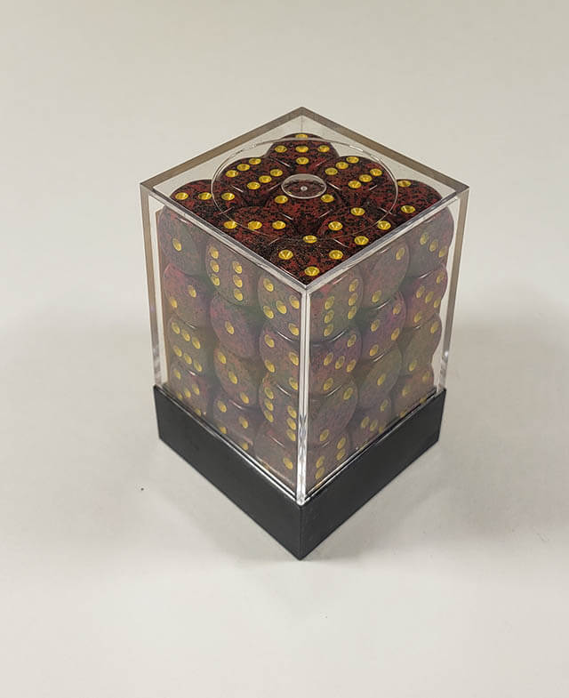 A close up of the Chessex specked mercury 12mm d6 dice set in its package.