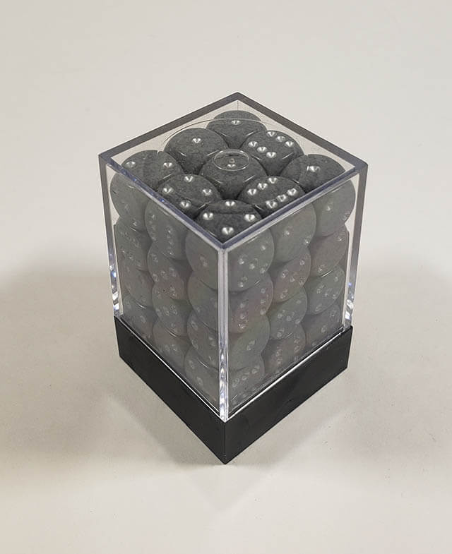 A close up of the Chessex specked hi-tech 12mm d6 dice set in its package.