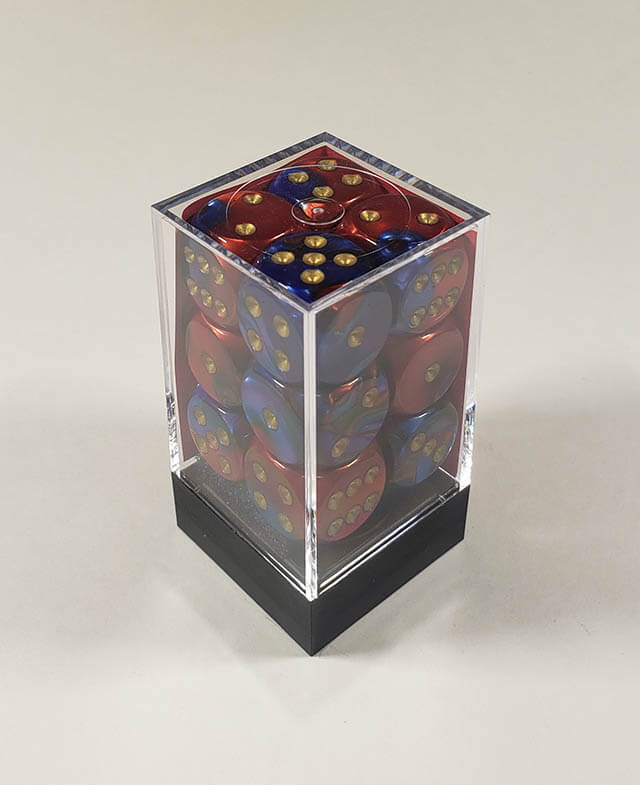A close up of the Chessex Gemini Blue and Red 16mm d6 dice set in its package.