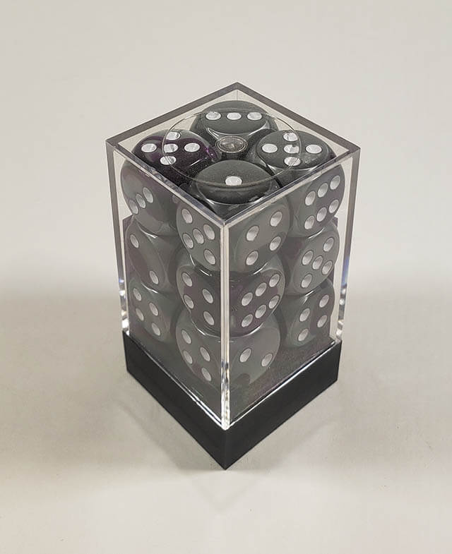 A close up of the Chessex Gemini Purple and Steel 16mm d6 dice set in its package.