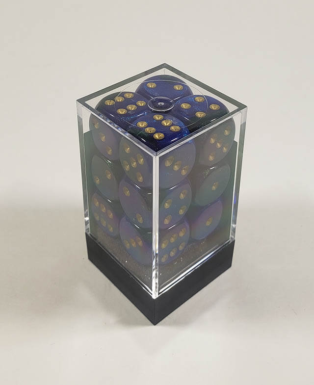 A close up of the Chessex Gemini Blue and gold 16mm d6 dice set in its package.