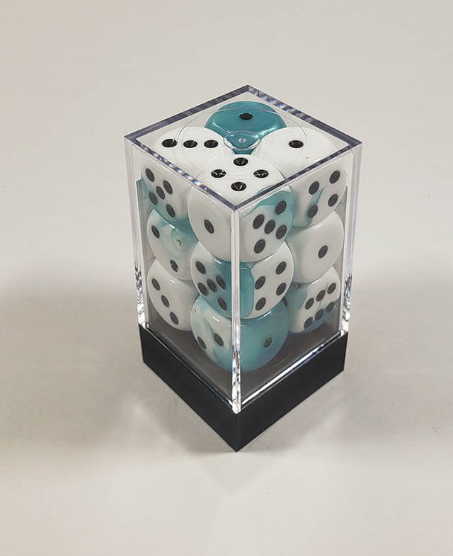 A close up of the Chessex Gemini Teal and White 16mm d6 dice set in its package.