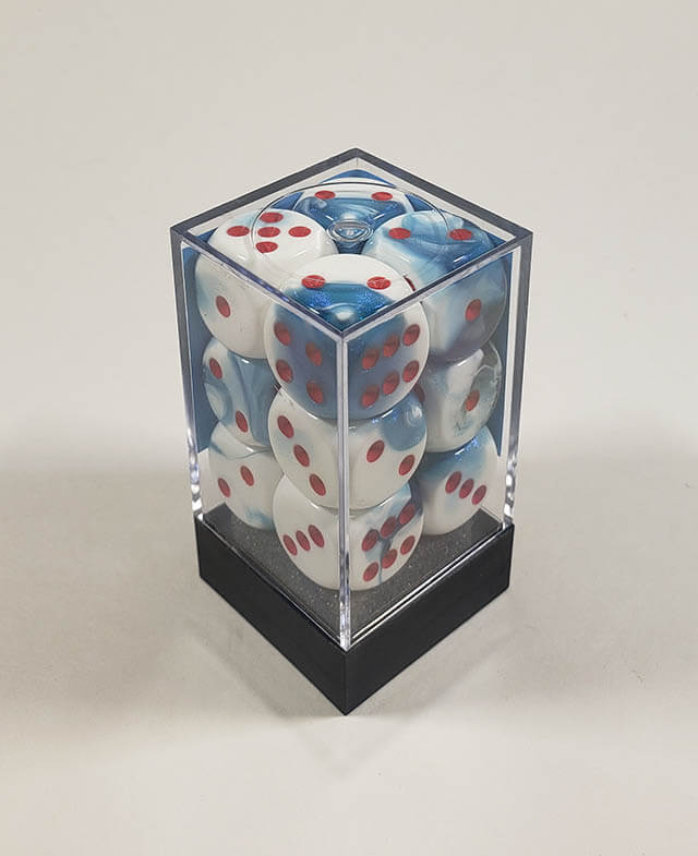 A close up of the Chessex Gemini Astral Blue 16mm d6 dice set in its package.