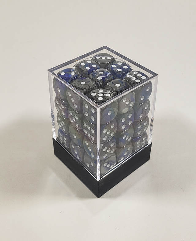 A close up of the Chessex Gemini  Blue and Steel 12mm d6 dice set in its package.