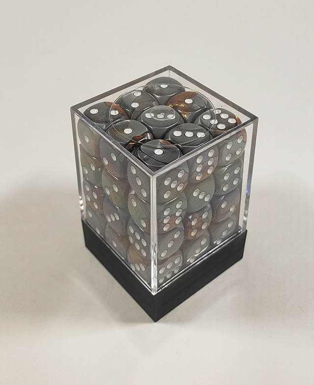 A close up of the Chessex Gemini Copper and Steel 12mm d6 dice set in its package.