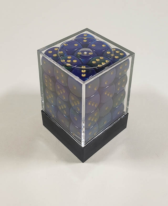 A close up of the Chessex Gemini Blue and Green 12mm d6 dice set in its package.