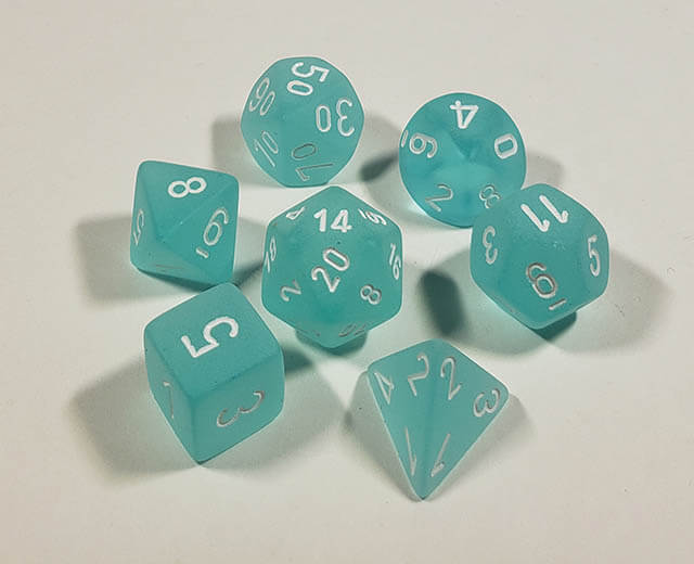A close up of the Chessex Frosted Teal polyhedral dice set.