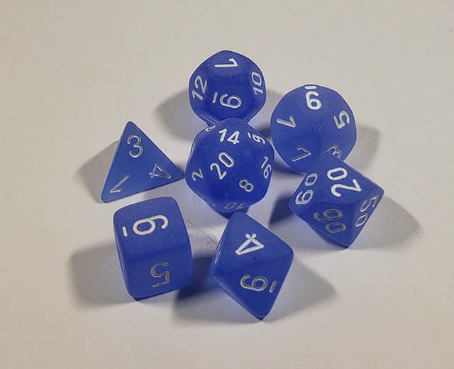 A close up of the Chessex Frosted Blue polyhedral dice set.