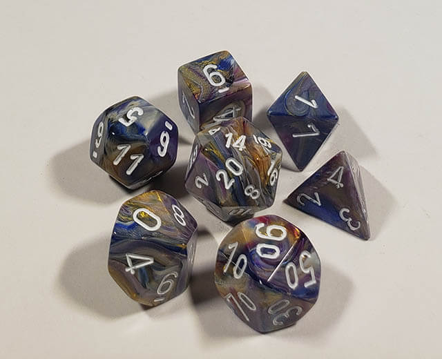 A close up of the Chessex Festive Carousel polyhedral dice set.