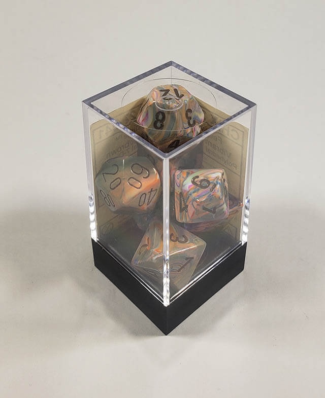 A close up of the Chessex Festive Vibrant Brown polyhedral dice set in its package.