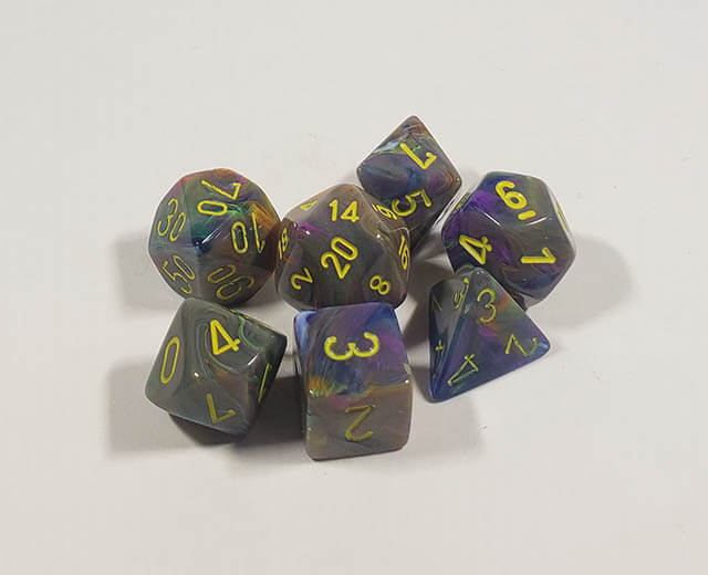 A close up of the Chessex Festive Rio polyhedral dice set.
