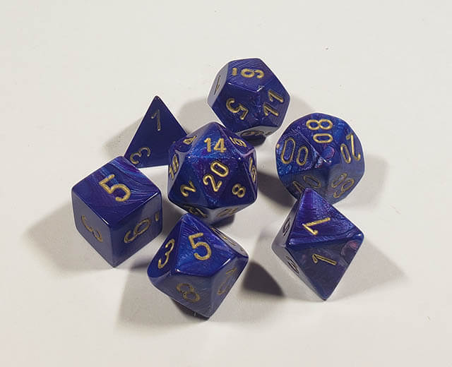 A close up of the Chessex Lustrous Purple polyhedral dice set.