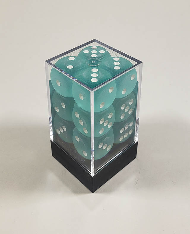 A close up of the Chessex Frosted Teal 16mm d6 dice set in its package.