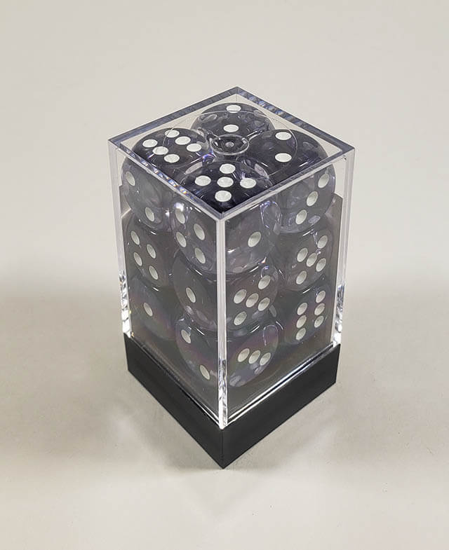 A close up of the Chessex Nebula Black 16mm d6 dice set in its package.