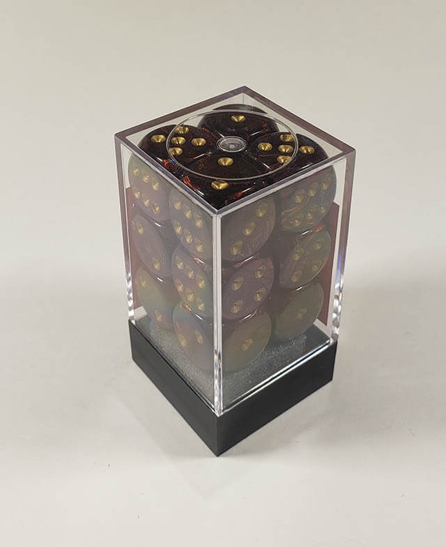 A close up of the Chessex Scarab Blue Blood 16mm d6 dice set in its package.