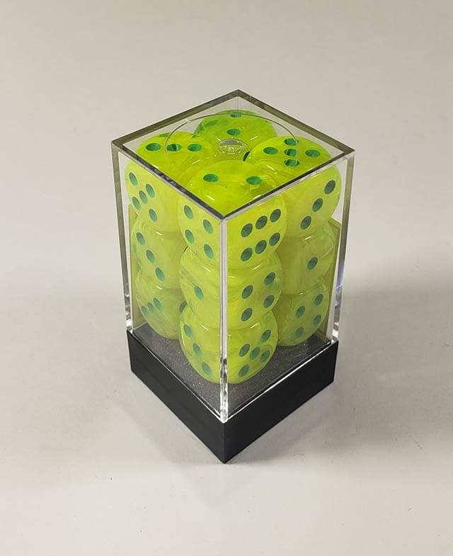 A close up of the Chessex Vortex Electric Yellow with green 16mm d6 set in its package.