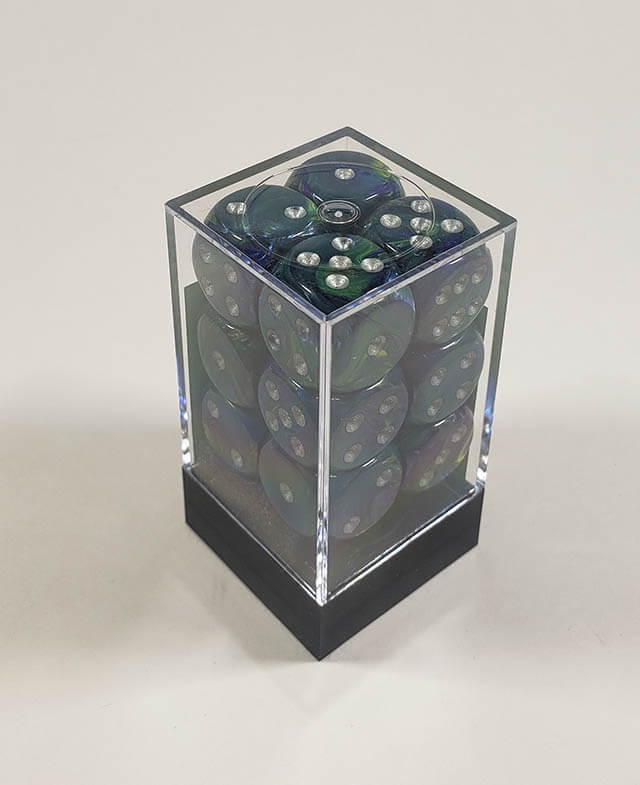 A close up of the Chessex Festive Green 16mm d6 dice set in its package.