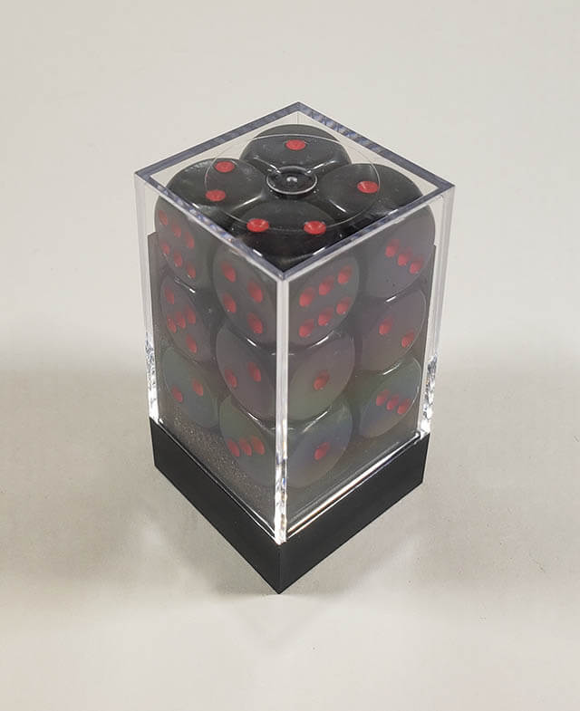 A close up of the Chessex Velvet black with red 16mm d6dice set in its packaging.