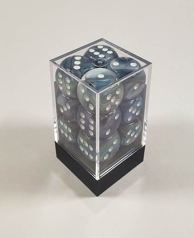 A close up of the Chessex Lustrous Slate 16mm d6 dice set in its package.