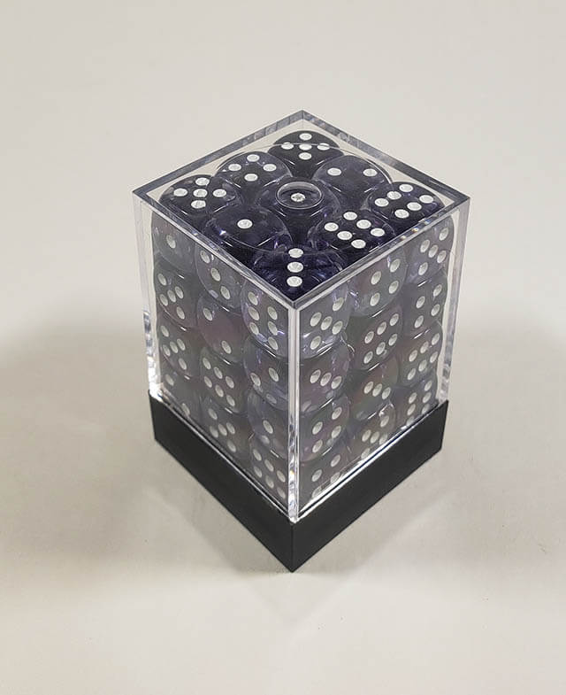 A close up of the Chessex Nebula Black 12mm d6 dice set in its package.