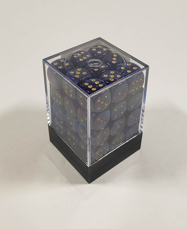 A close up of the Chessex Scarab Royal Blue 12mm d6 dice set in its package.