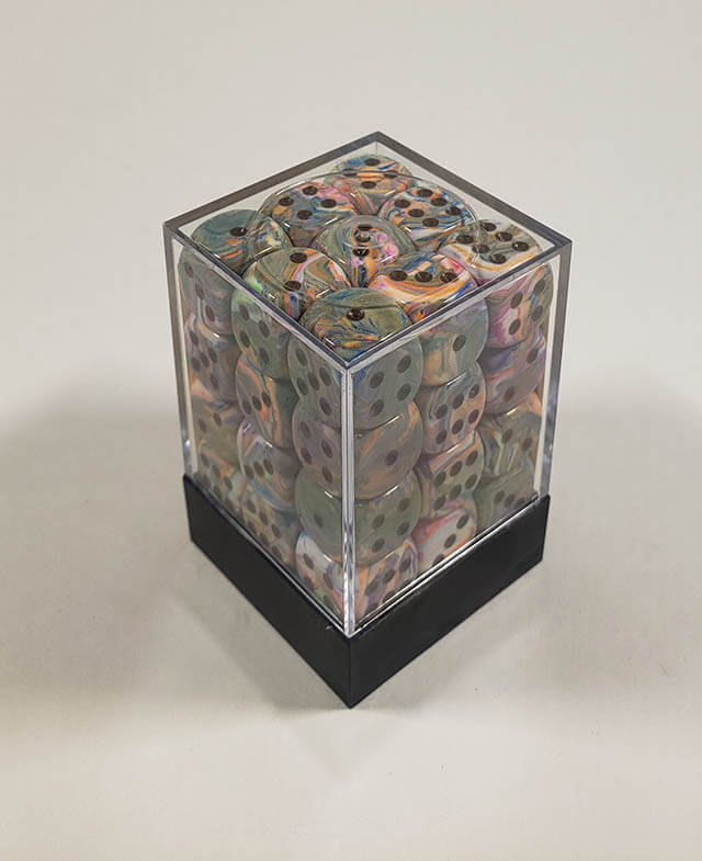 A close up of the Chessex Festive Vibrant 12mm d6 dice set in its package.