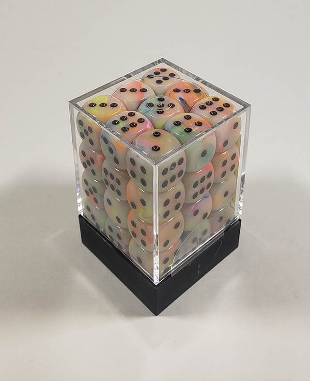 A close up of the Chessex Festive Circus 12mm d6 dice set in its package.