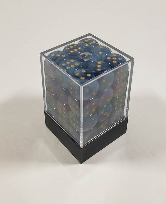A close up of the Chessex Phantom Teal 12mm d6 dice set in its package.