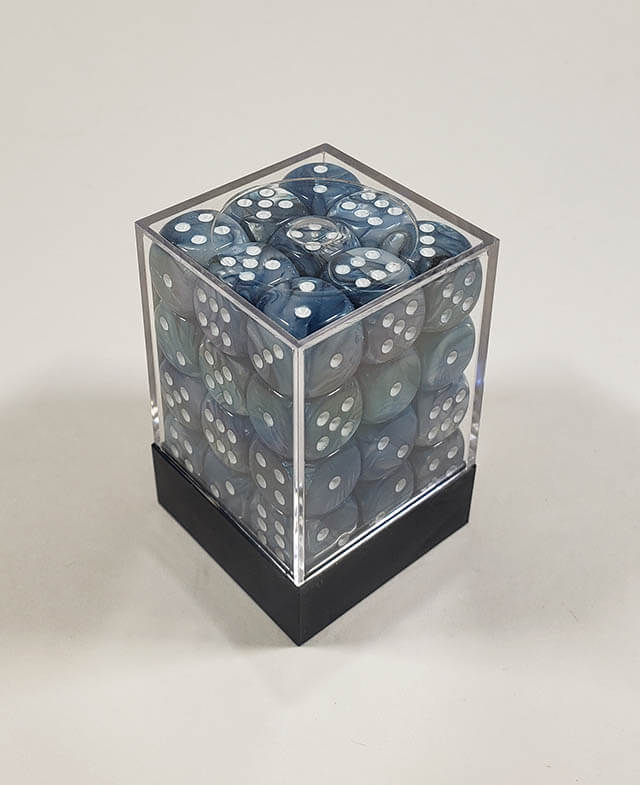 A close up of the Chessex Lustrous Slate 12mm d6 dice set in its package.