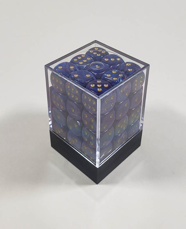 A close up of the Chessex Lustrous Purple 12mm d6 dice set in its package.