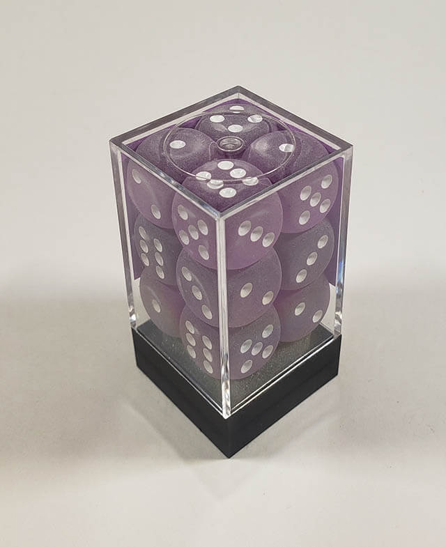 A close up of the Chessex Festive Purple 16mm d6 dice set in its package.