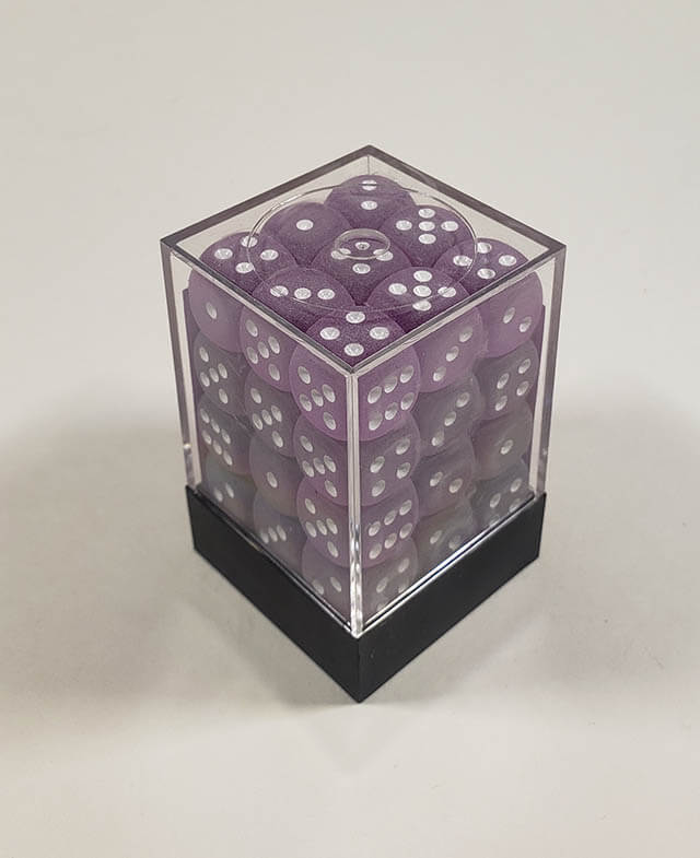 A close up of the Chessex Frosted Purple 12mm d6 dice set in its package.