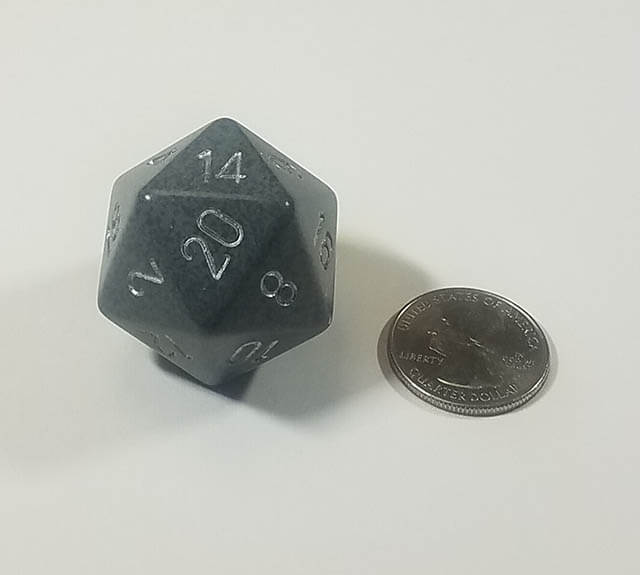 Green 34mm d20 with quarter for scale. 
